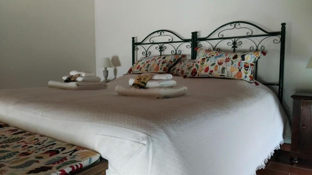 Postel nebo postele na pokoji v ubytování B&B Le Ripe