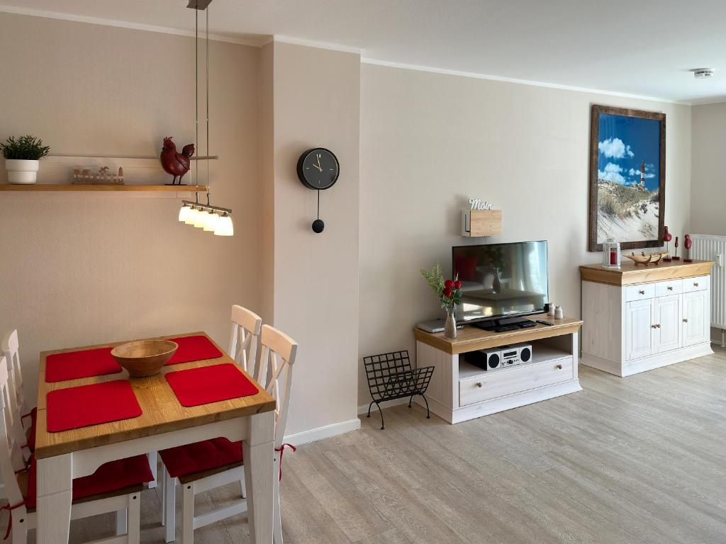 TV a/nebo společenská místnost v ubytování Strand Residenz Amrum *Strand Residenz 11*