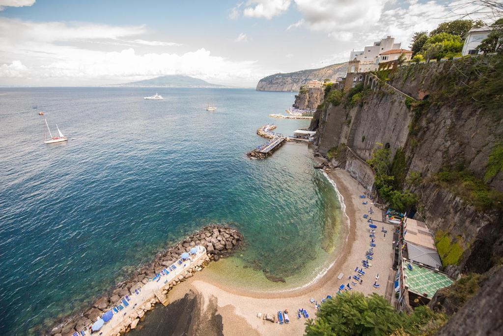 an aerial view of a beach next to the ocean at Sorrento Central Flats in Sorrento