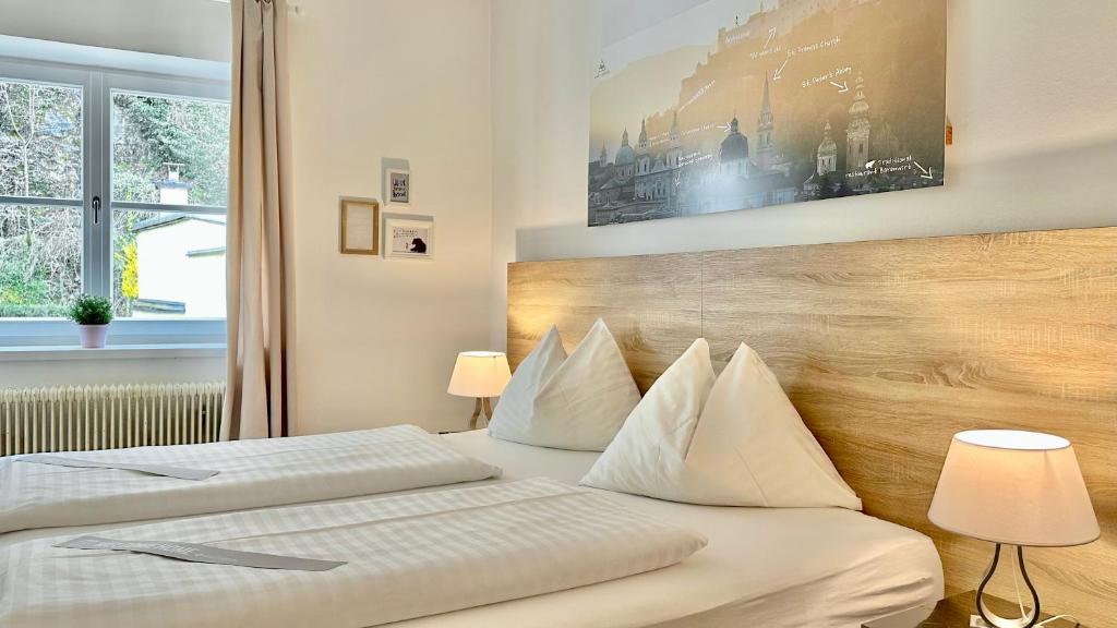 Posteľ alebo postele v izbe v ubytovaní Hotel Krone 1512