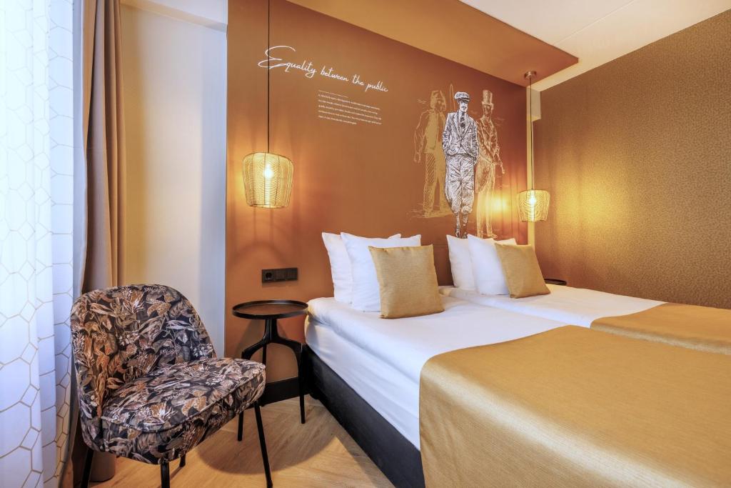 Een bed of bedden in een kamer bij Hotel Die Port van Cleve