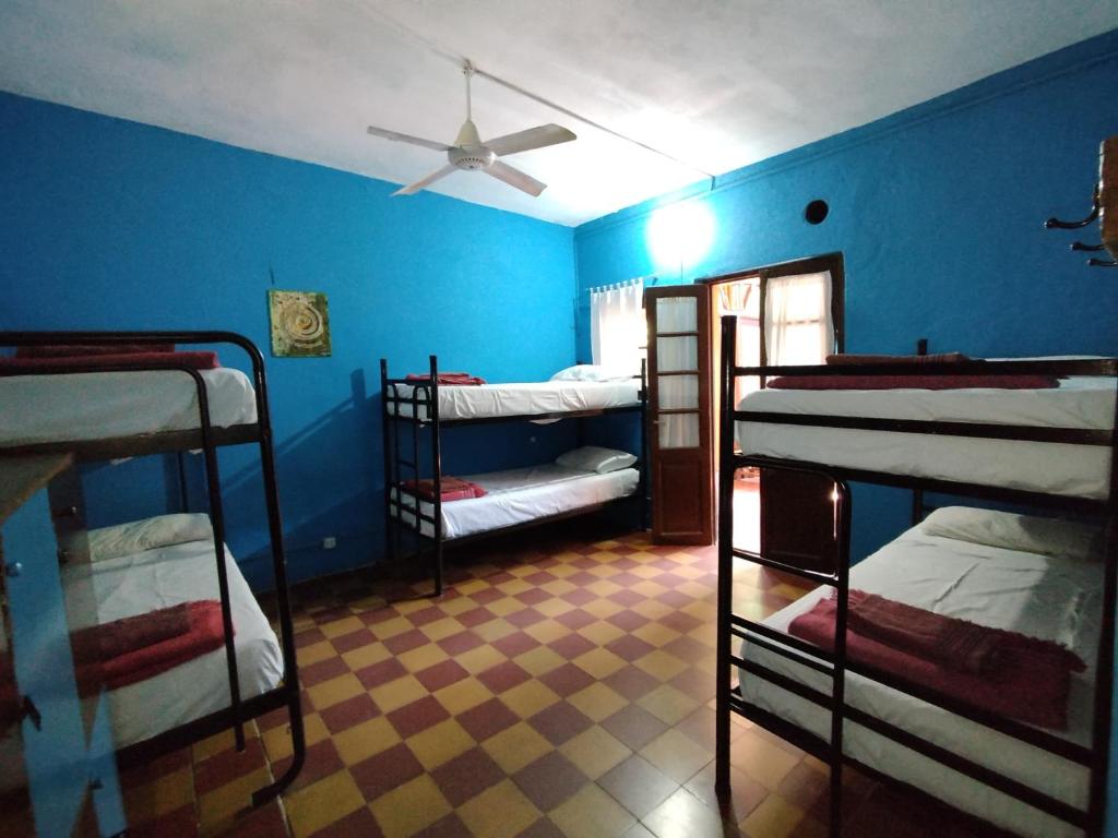 Postel nebo postele na pokoji v ubytování Andamundos Hostel