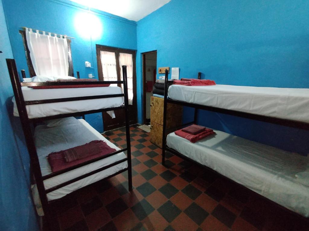 Postel nebo postele na pokoji v ubytování Andamundos Hostel