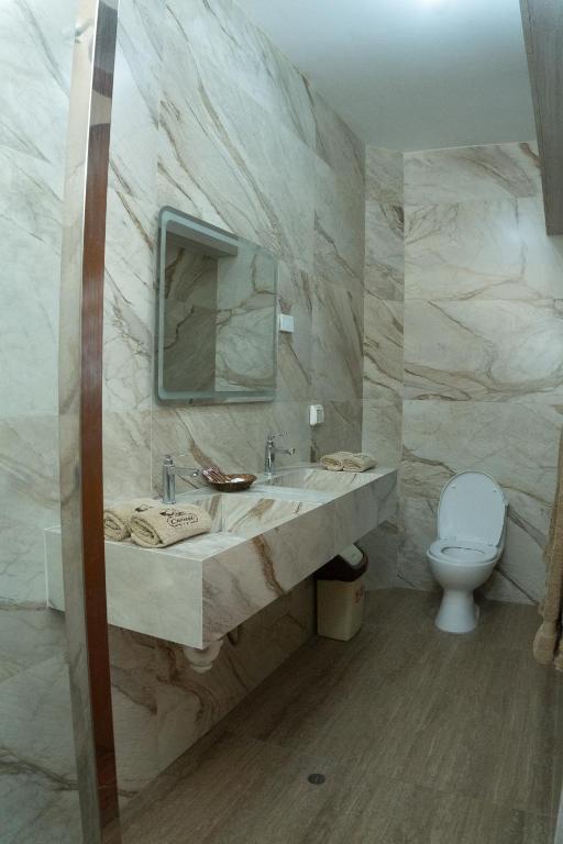 Koupelna v ubytování Hotel Curasi