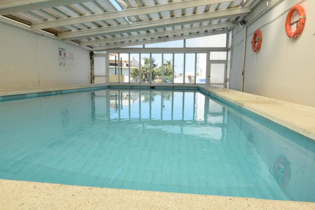 The swimming pool at or close to RNET - Puerto Simona 1-9 Roses Costa Brava