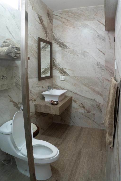Koupelna v ubytování Hotel Curasi