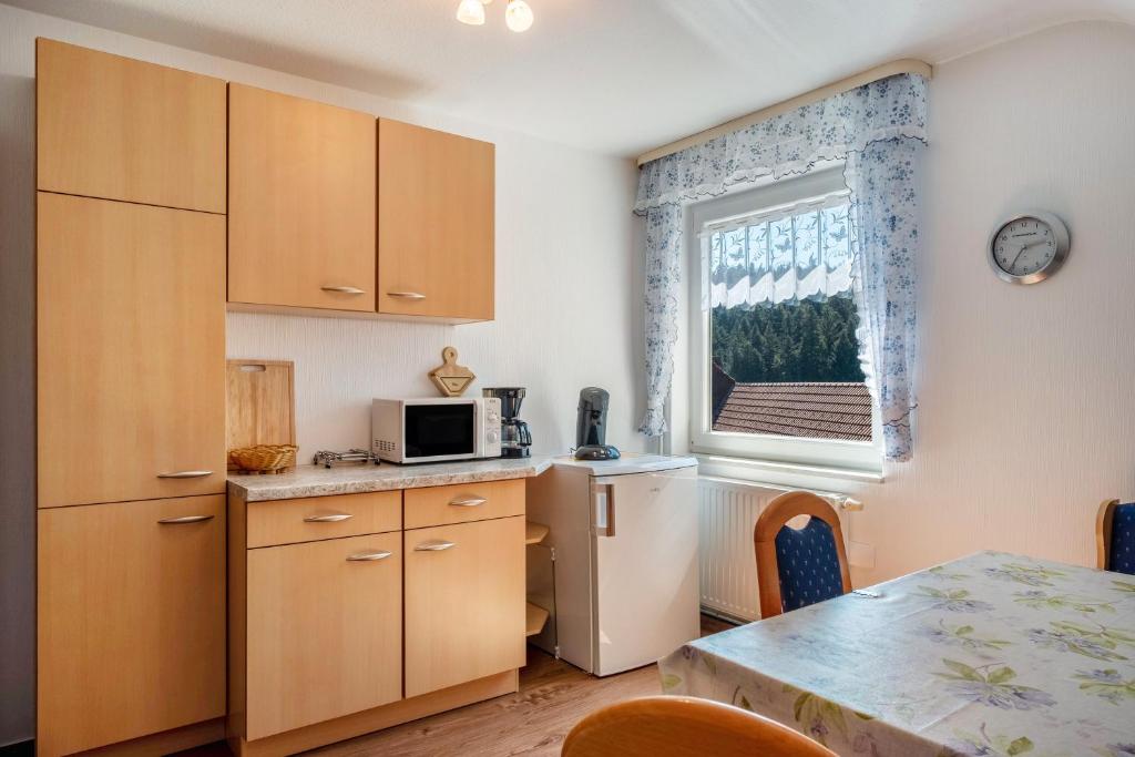 Kuchyň nebo kuchyňský kout v ubytování Unterfalkenhof