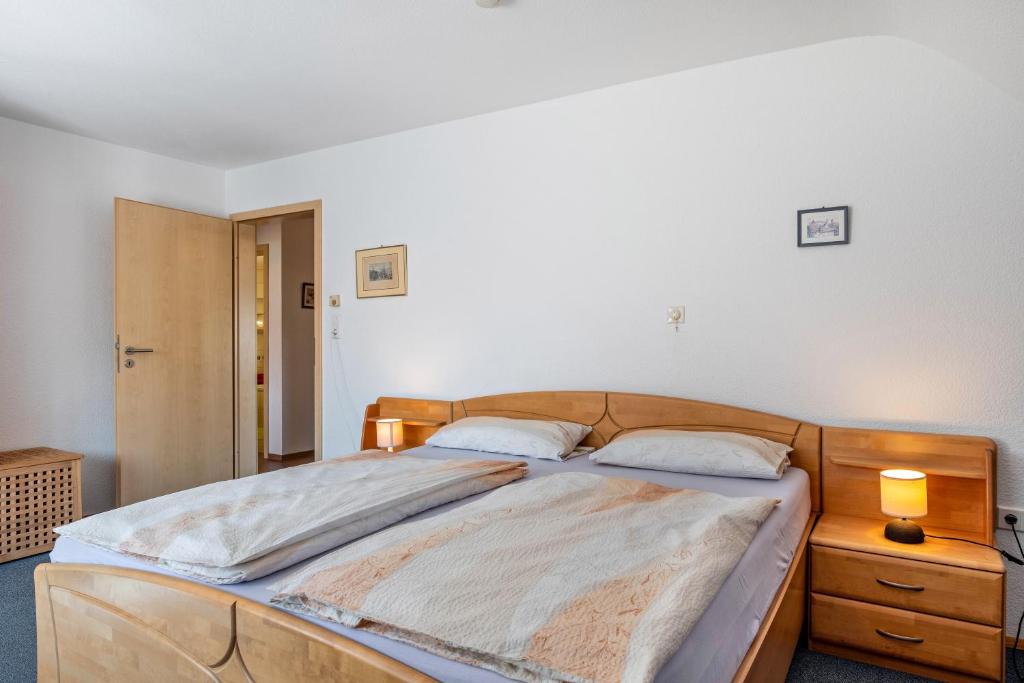 Postel nebo postele na pokoji v ubytování Unterfalkenhof
