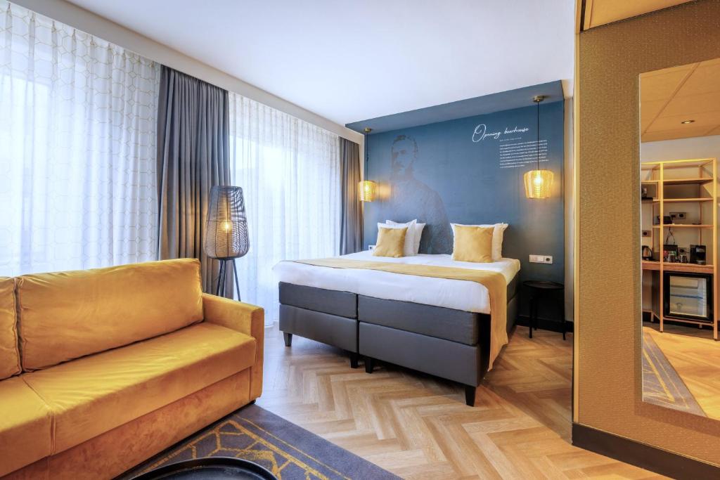 Een bed of bedden in een kamer bij Hotel Die Port van Cleve