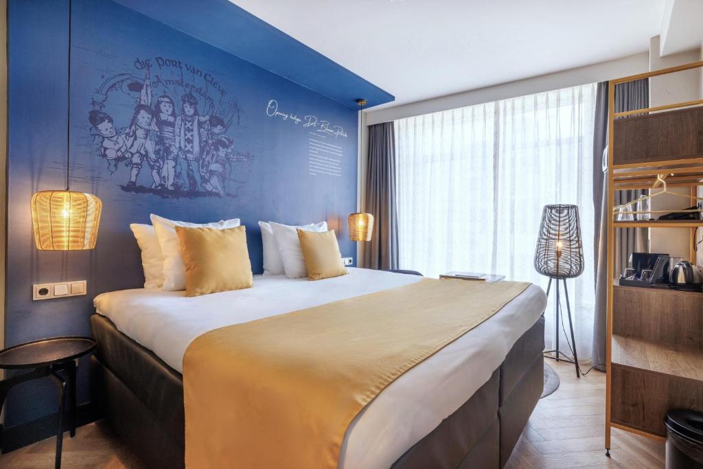 Een bed of bedden in een kamer bij Hotel Die Port van Cleve