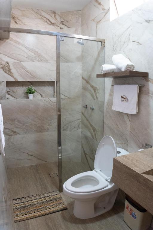 Koupelna v ubytování Hotel Curasi