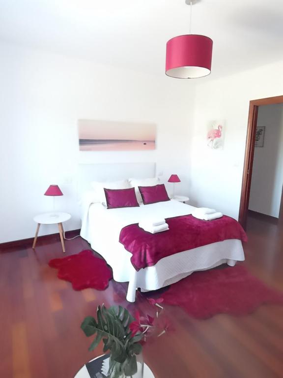 Posteľ alebo postele v izbe v ubytovaní CASA AMELIA Apartamento Bajo con terraza y jardín Apartamento 1ªPlanta