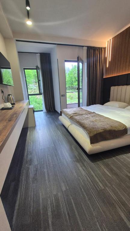 Postel nebo postele na pokoji v ubytování Tskaltubo Epic Hotel & Spa
