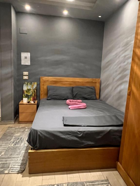 Postel nebo postele na pokoji v ubytování Pyramids INN