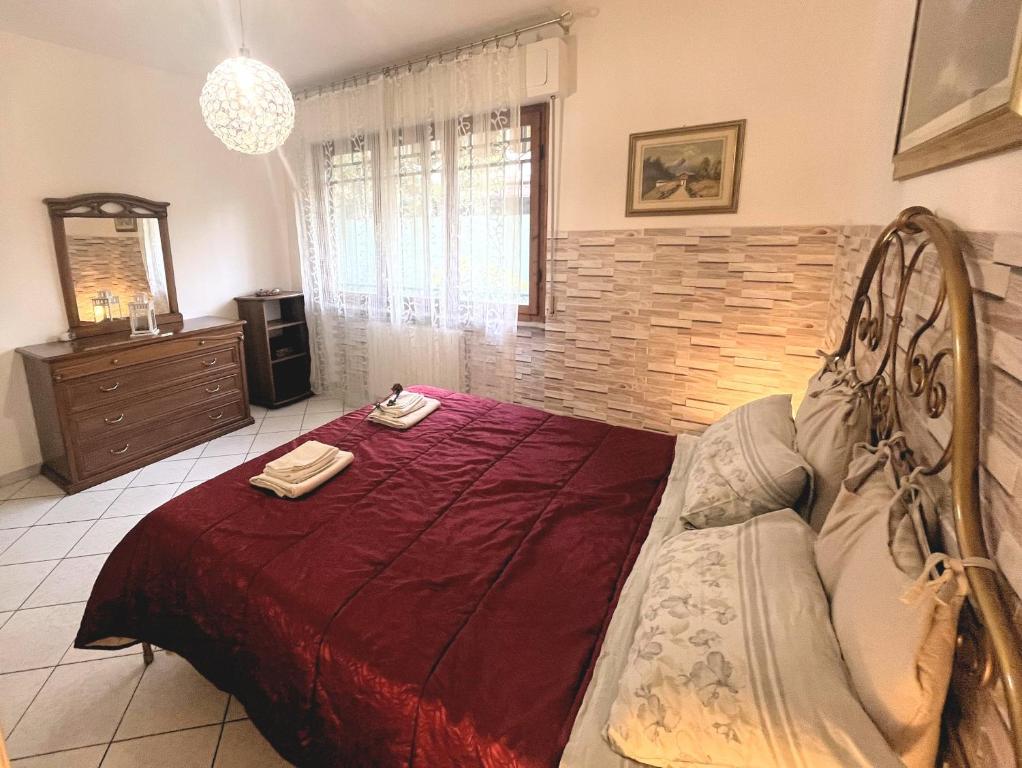 Łóżko lub łóżka w pokoju w obiekcie Comfort House Pisa