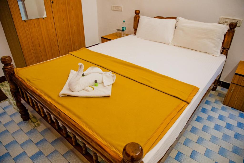 Postel nebo postele na pokoji v ubytování Mb maison blanche