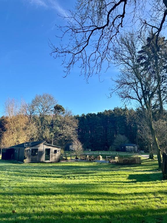 Zahrada ubytování Riverside Cabins