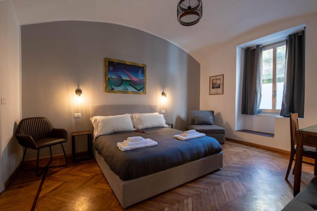 Postel nebo postele na pokoji v ubytování MARCONI ROOMs TORINO