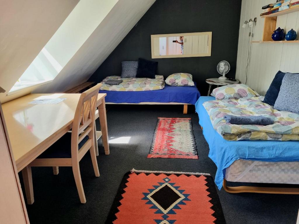 Postel nebo postele na pokoji v ubytování Guesthouse Grønnegade