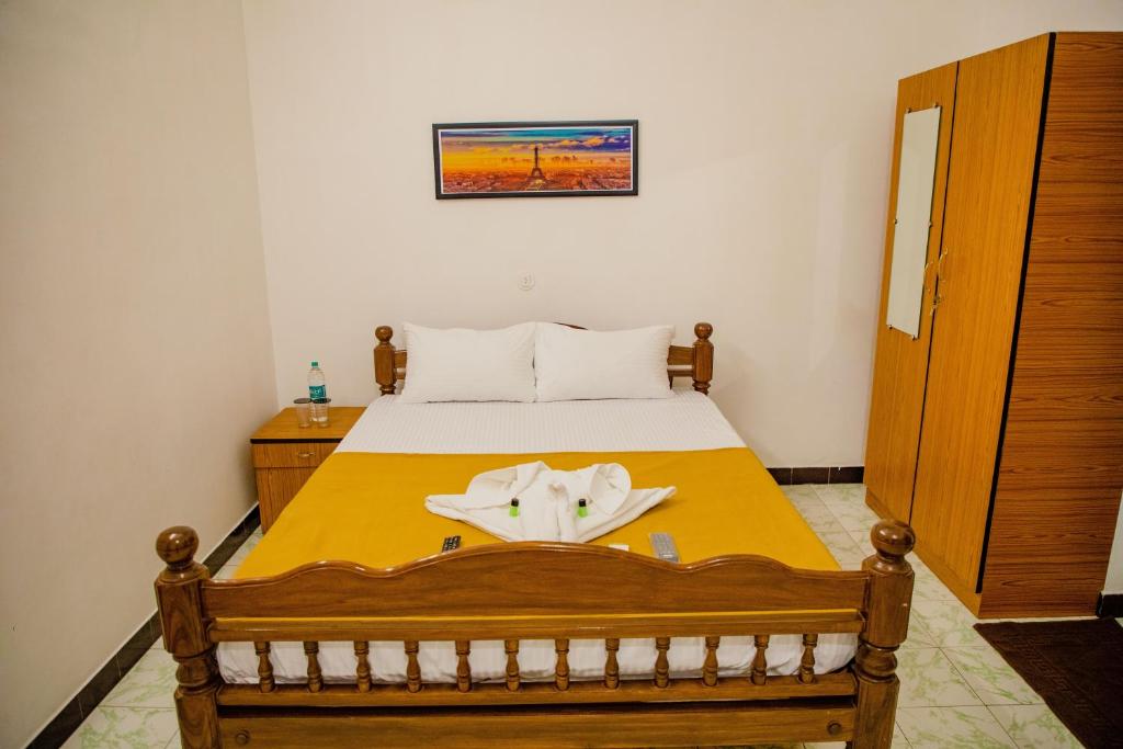 Postel nebo postele na pokoji v ubytování Mb maison blanche