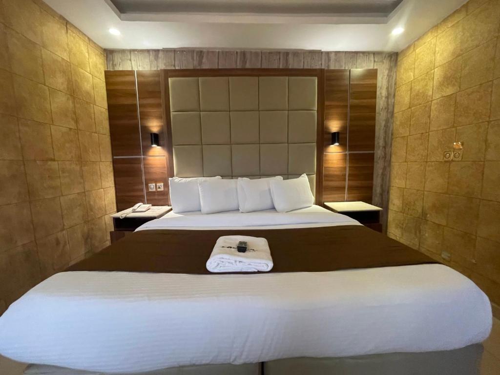 Postel nebo postele na pokoji v ubytování Presken Residence