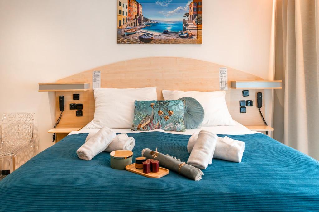 Postel nebo postele na pokoji v ubytování Hotel Plzeň