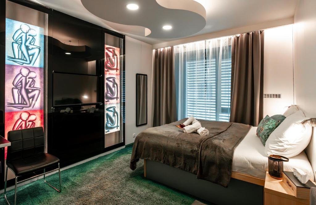 Postel nebo postele na pokoji v ubytování Hotel Plzeň