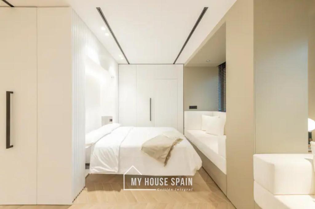 Postel nebo postele na pokoji v ubytování MyHouseSpain - Luminoso piso en Chamberí