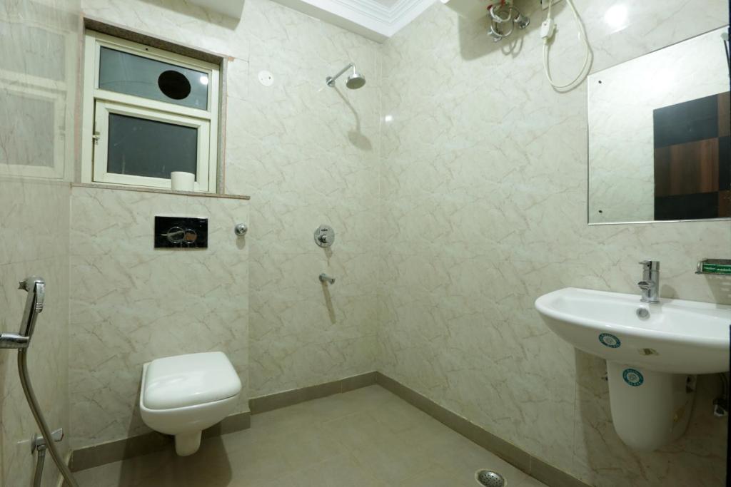 Koupelna v ubytování Hotel Palm Emarald