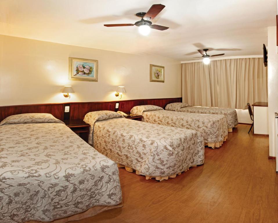 Postel nebo postele na pokoji v ubytování Lira Hotel