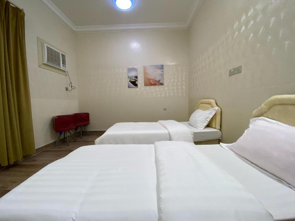 Postel nebo postele na pokoji v ubytování Villa 94 Ras Al Hadd