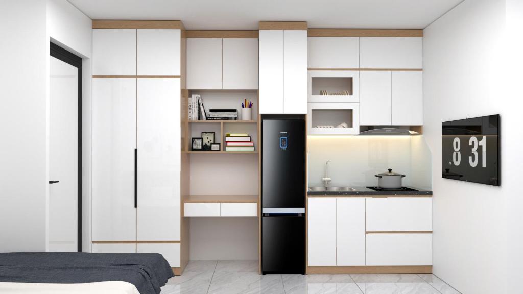 Kuchyň nebo kuchyňský kout v ubytování Ami Home Đội Cấn