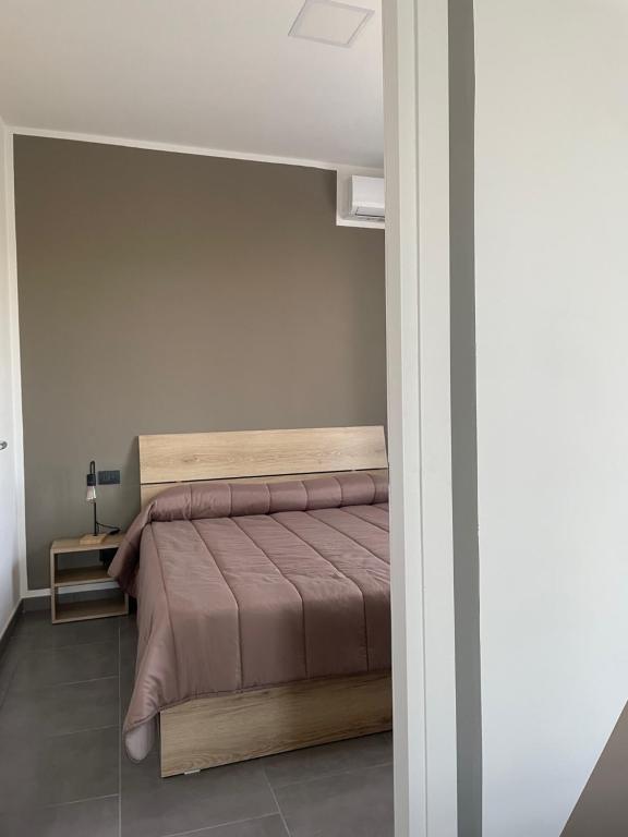 Postel nebo postele na pokoji v ubytování Hotel Riesco