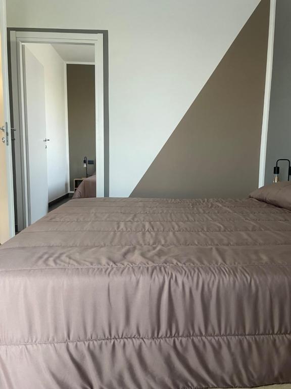 Postel nebo postele na pokoji v ubytování Hotel Riesco