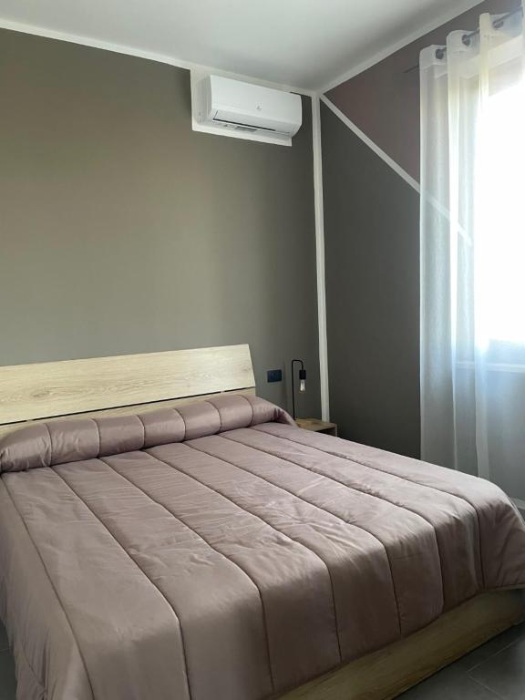 Postel nebo postele na pokoji v ubytování Hotel Riesco