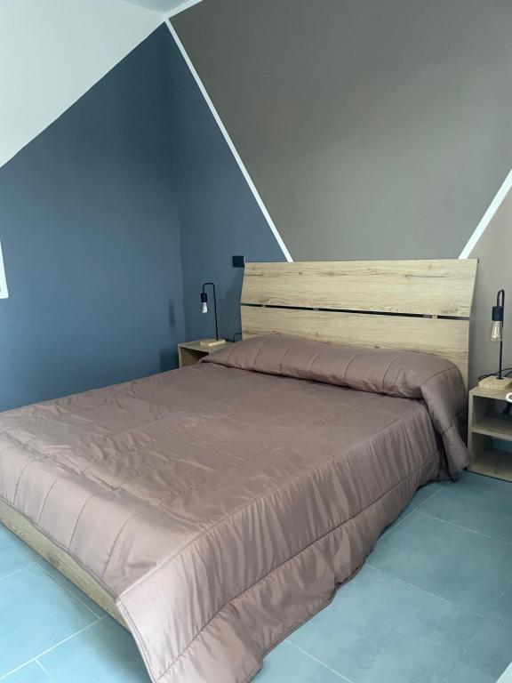 Postel nebo postele na pokoji v ubytování Hotel Riesco
