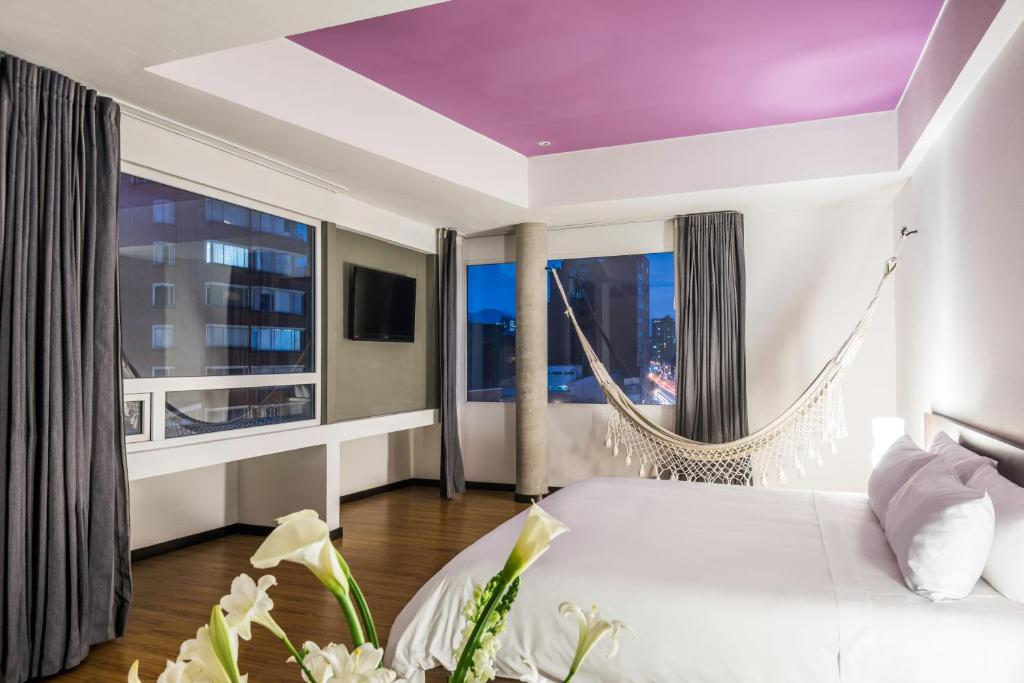 Postel nebo postele na pokoji v ubytování Hotel Viaggio 617