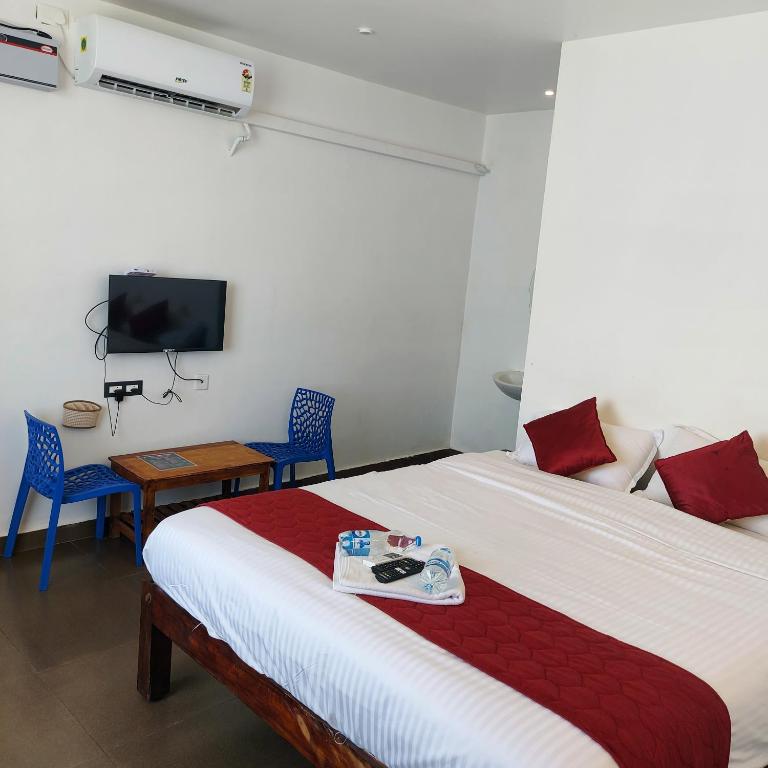 TV a/nebo společenská místnost v ubytování Pravin Beach Resort