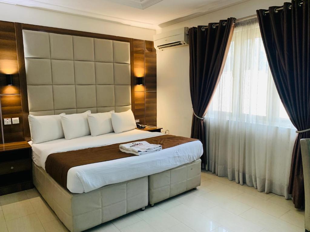 Postel nebo postele na pokoji v ubytování Presken Hotels @ Freedom Way, Lekki