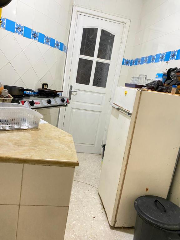 Kuchyň nebo kuchyňský kout v ubytování Apartment Tunis