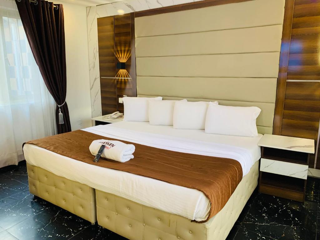 Postel nebo postele na pokoji v ubytování Presken Hotels @ Freedom Way, Lekki