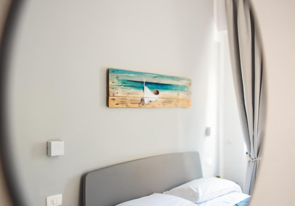 Postel nebo postele na pokoji v ubytování Camere Margot