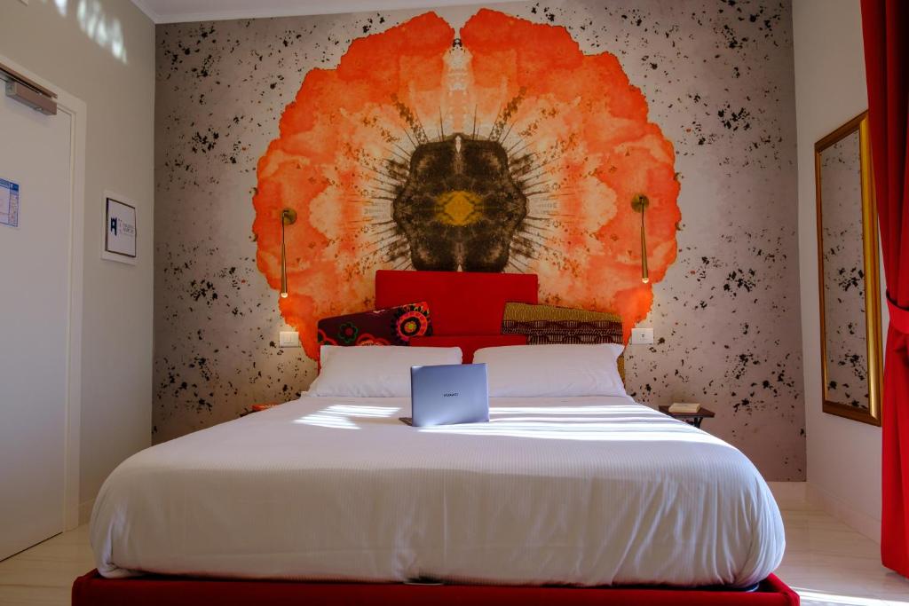Postel nebo postele na pokoji v ubytování Palazzo Adele Rooms & Apartments