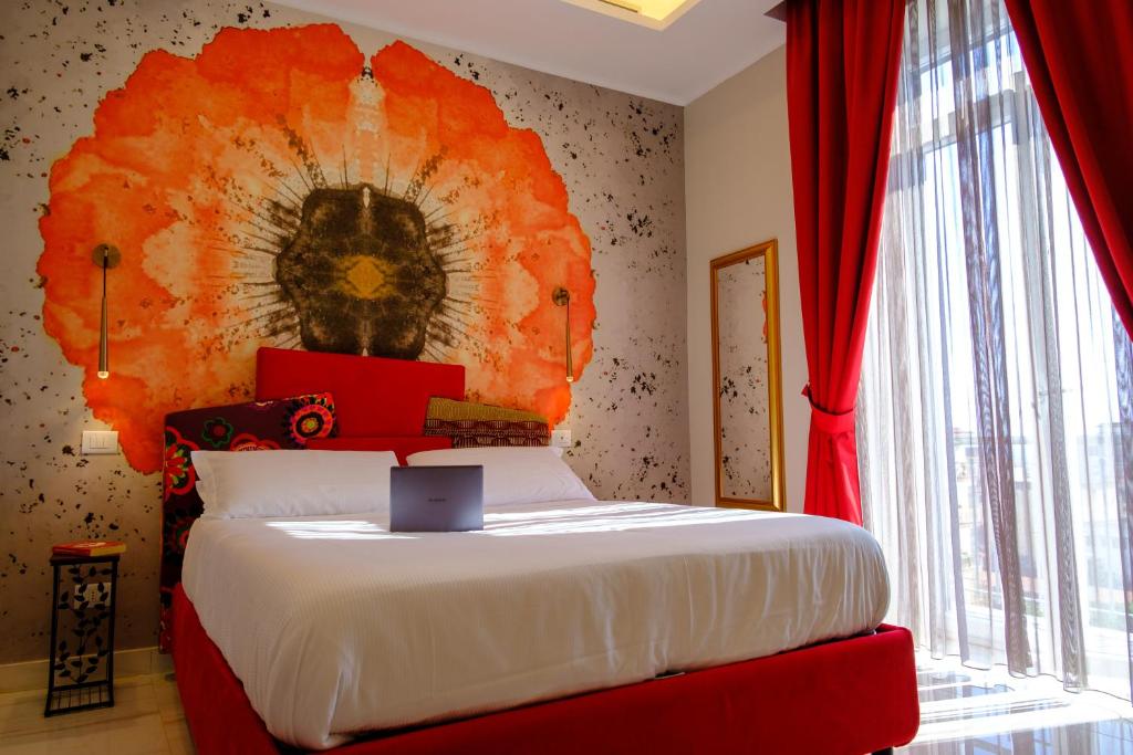 Postel nebo postele na pokoji v ubytování Palazzo Adele Rooms & Apartments