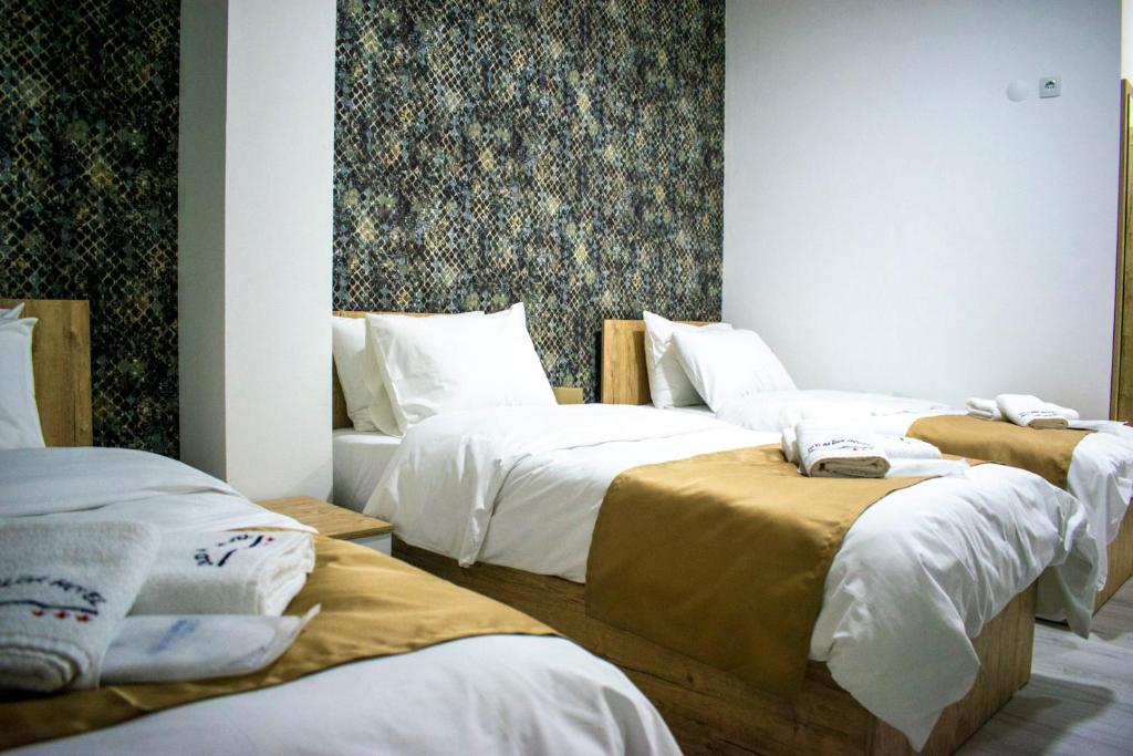 Postel nebo postele na pokoji v ubytování Hotel Alisa