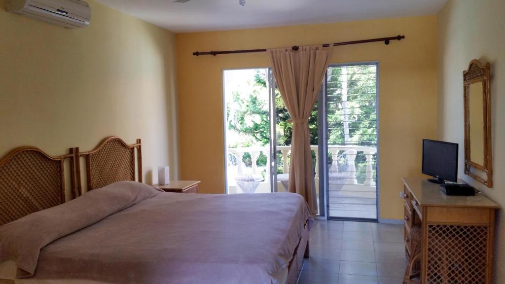 Postel nebo postele na pokoji v ubytování Hotel Voramar