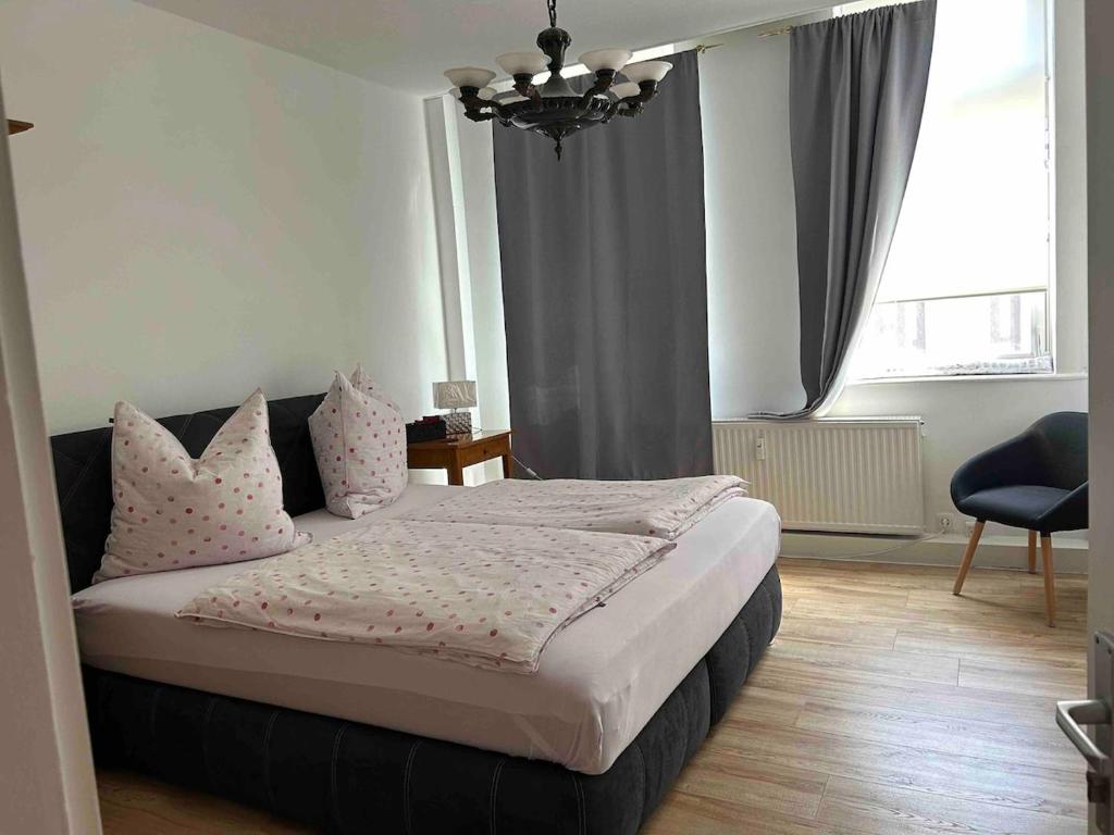 Postel nebo postele na pokoji v ubytování House of Aurelie