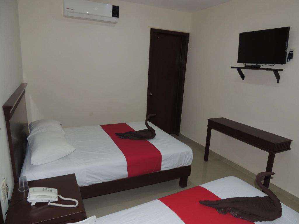Postel nebo postele na pokoji v ubytování Hotel Villamar