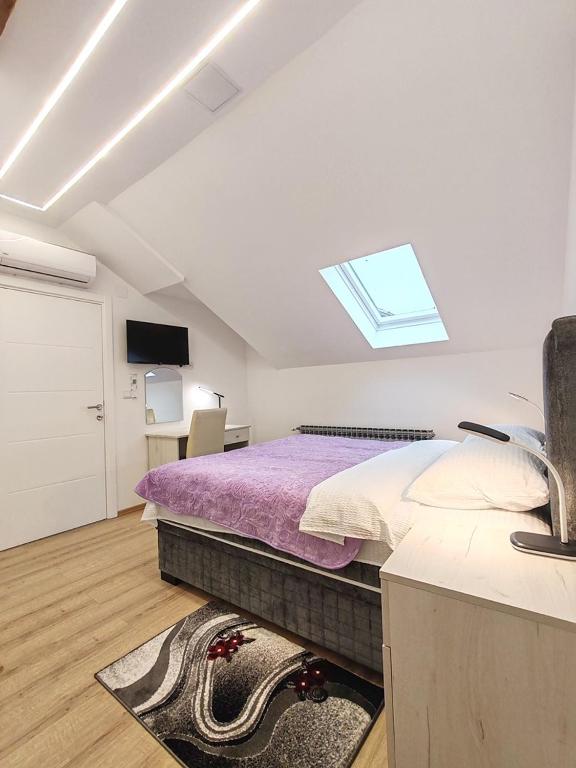 Postel nebo postele na pokoji v ubytování Rooms DM - Una
