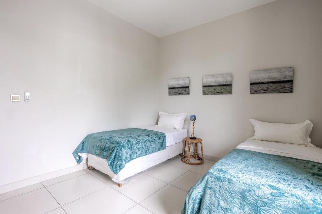 Voodi või voodid majutusasutuse Sea view apartment toas